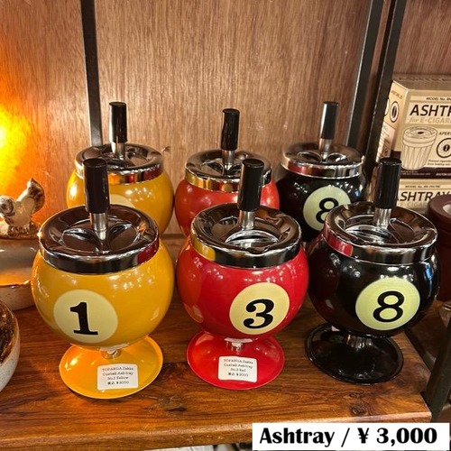 TOPANGA Zakka billiards Ball Ashtray, Red, Yellow, and Black. This billiards ball-shaped ashtray is perfect as a decorative ornament or as a pop art piece. Also available: a cue ball in red, yellow, and black.