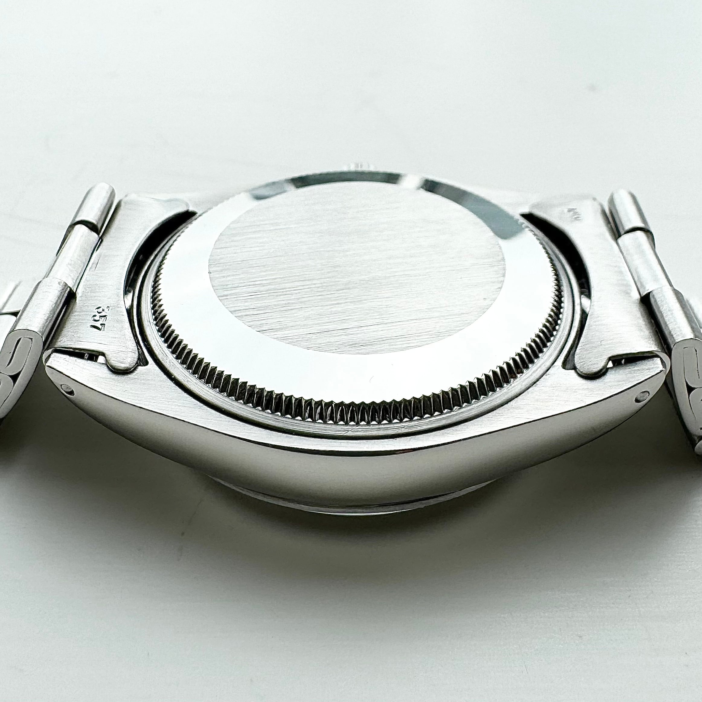 Rolex Oyster Perpetual 1002 (35*****) Silver Mosaic dial | Nivram