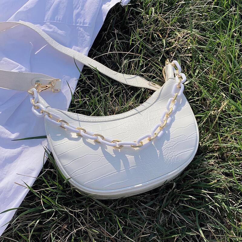 今年の人気のスモールバッグ女性2020新しい波のファッションシンプルなワンショルダー脇の下のバッグ野生の女性の三日月形のバッグ Tiancai_Wing_Bag1361424