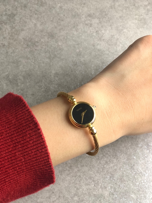 GUCCI グッチ 腕時計 ゴールド×ブラック バングル型 ツイスト 2700.2.L vintage ヴィンテージ オールド wbefek