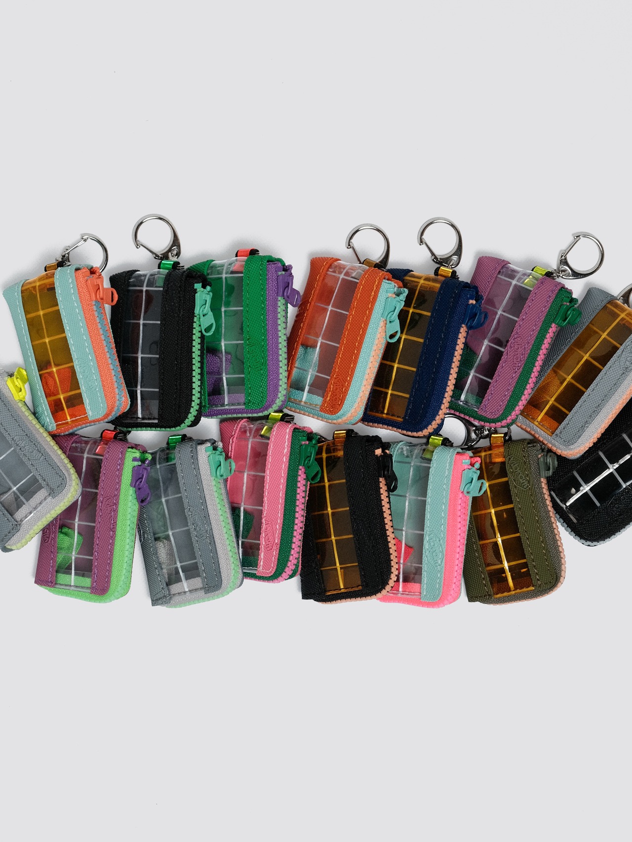 vibram coin pouch keychain (navy×orange) with orange glowing zip