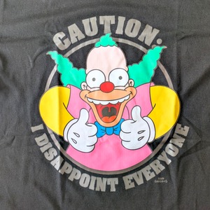 【 The Simpsons（ ザ・シンプソンズ ) 】『 CAUTION: I DISAPPOINT EVERYONE 』クラスティ・ザ・クラウン / Tシャツ〚アメリカン雑貨 アメトイ〛