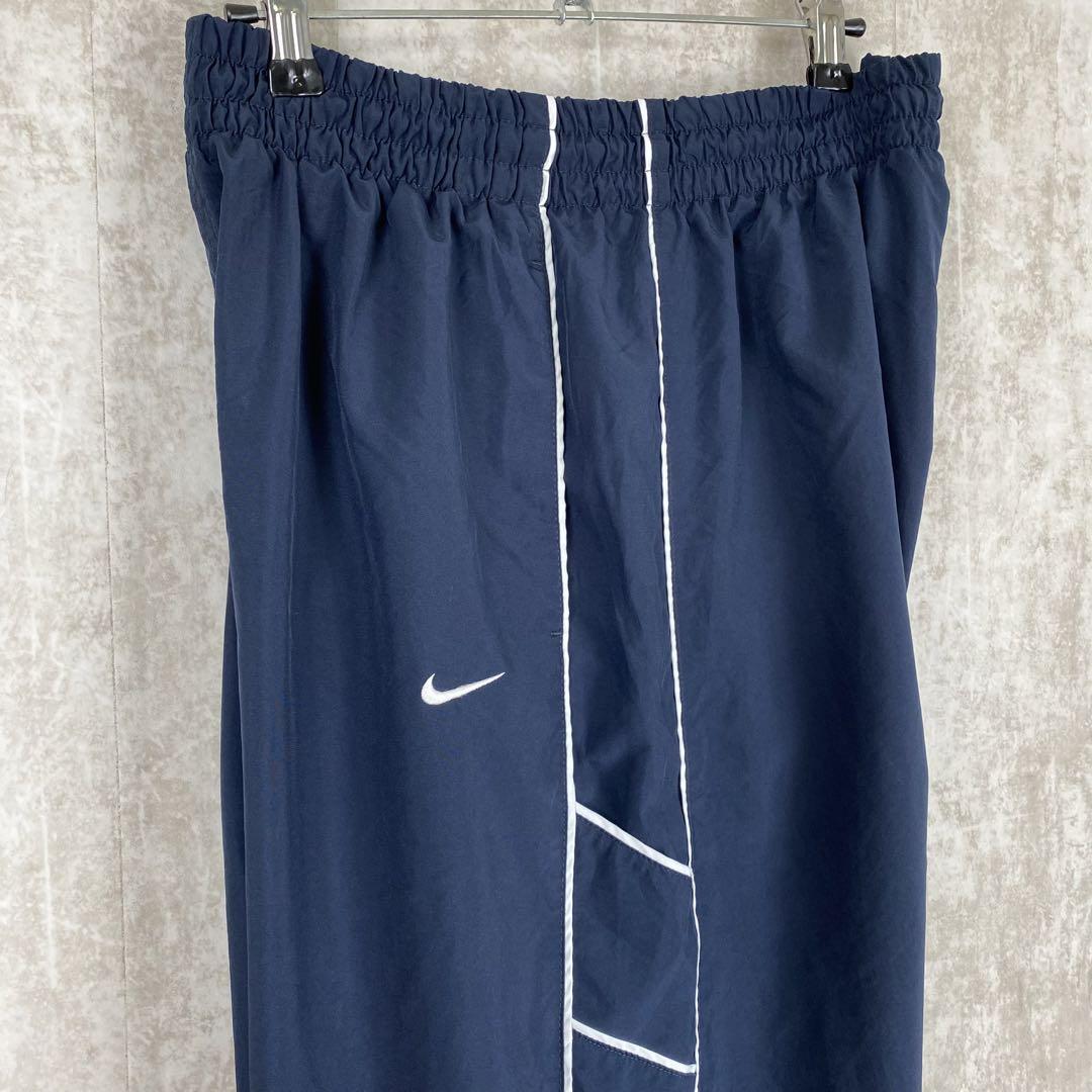 L 00s ナイキ ナイロン トラックパンツ サイドライン スウッシュ 紺色