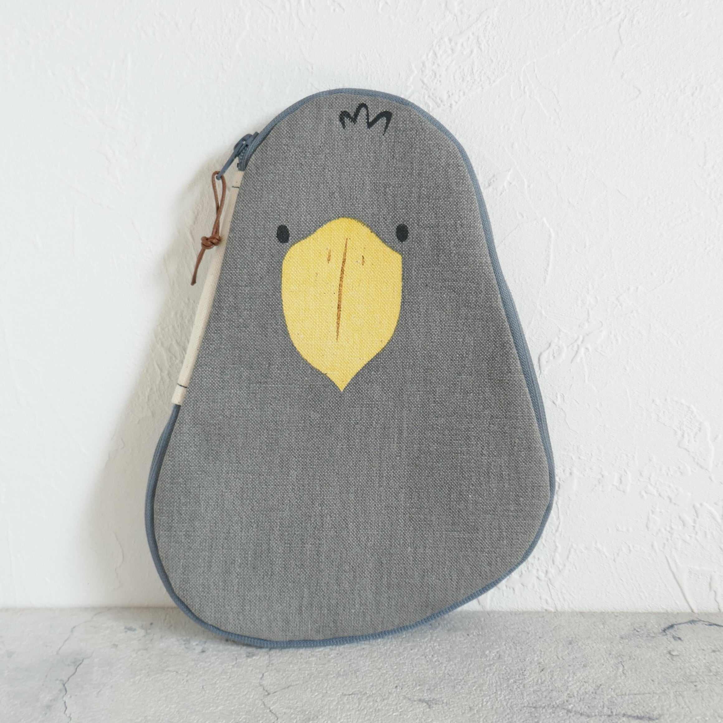 ハシビロコウのポーチ gray | zakka 7070ーオリジナルテキスタイル、手