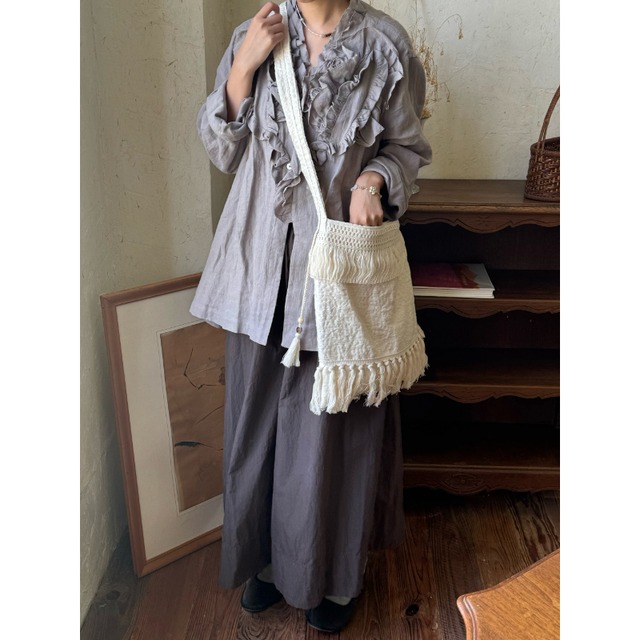 POTIタッセル付きベージュ布バッグ