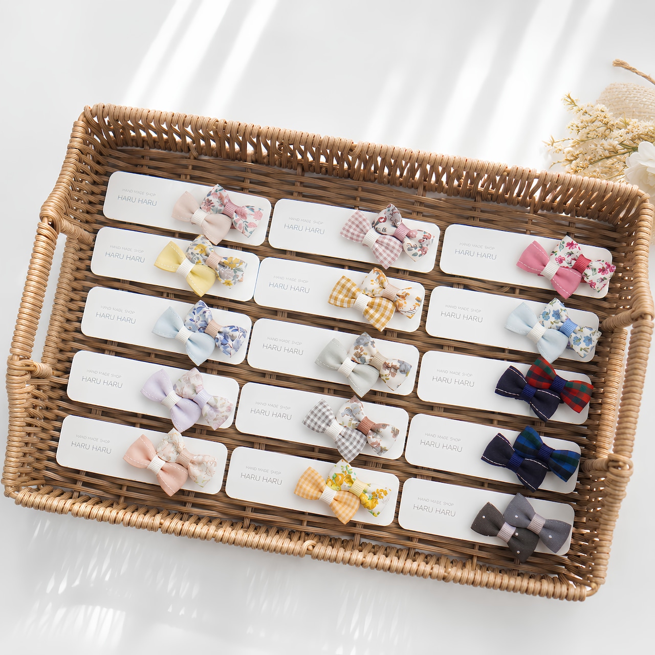 ダブルリボン ベビーヘアクリップ｜LIBERTYプリント／滑り止め付き