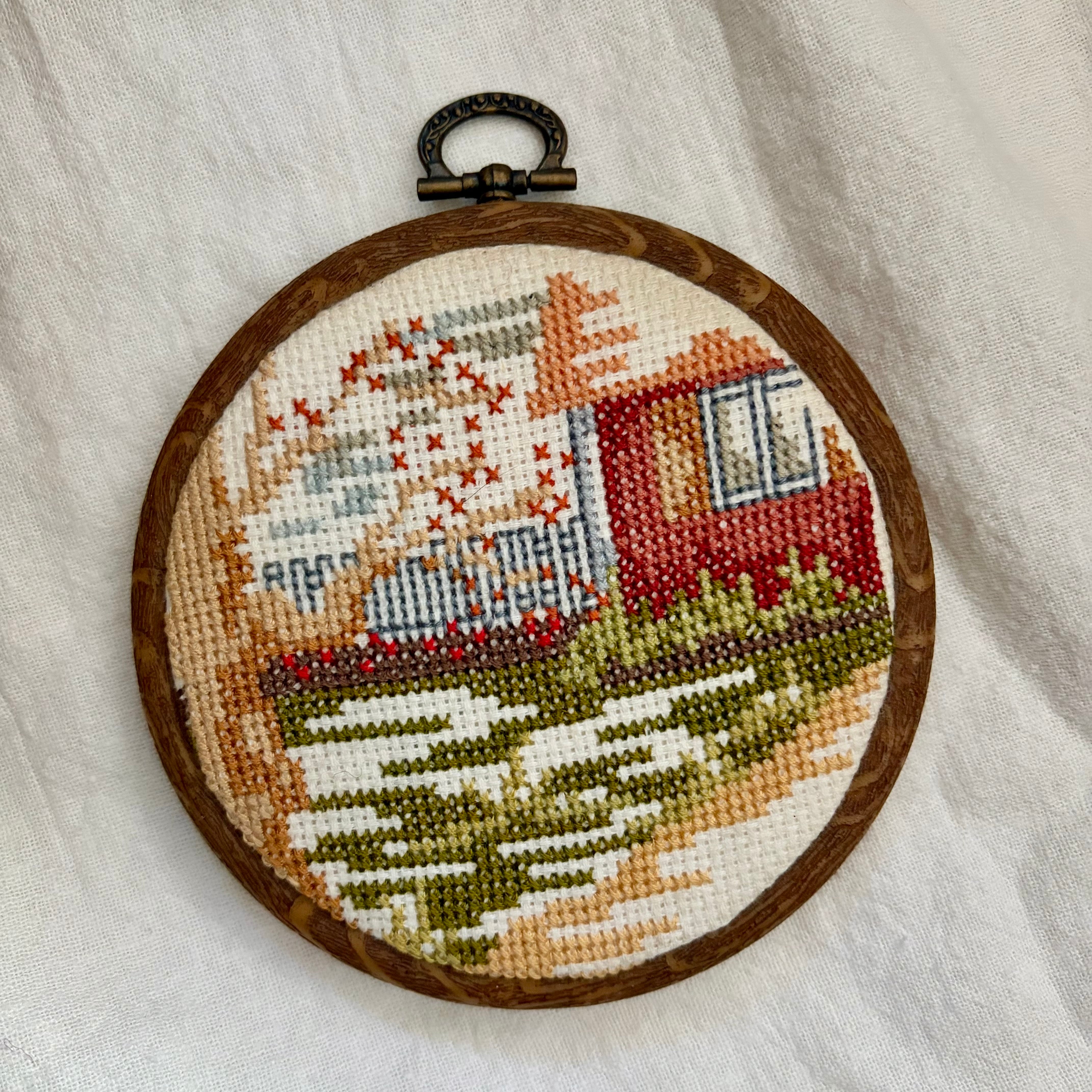 スウェーデンの風景の刺繍絵