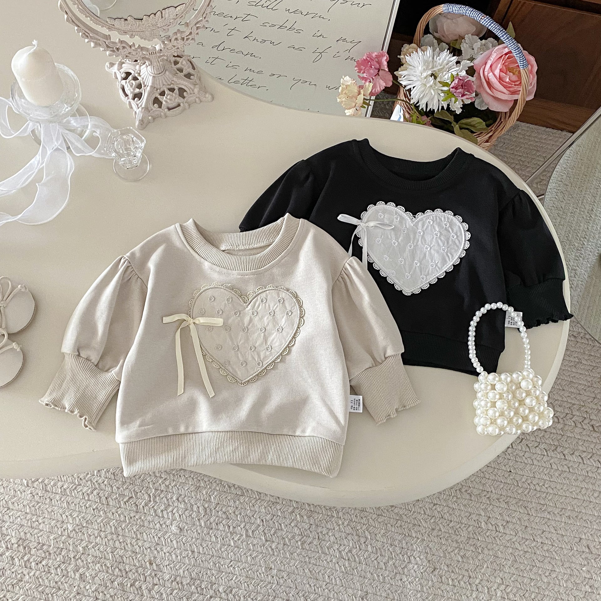 パフスリーブハートリボントレーナー