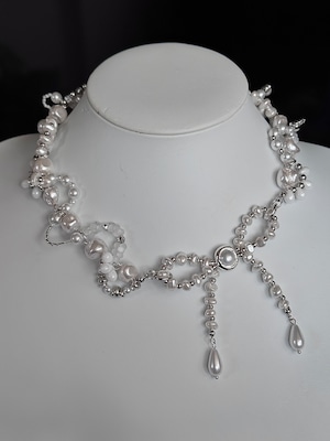Pearl ribbon necklace.