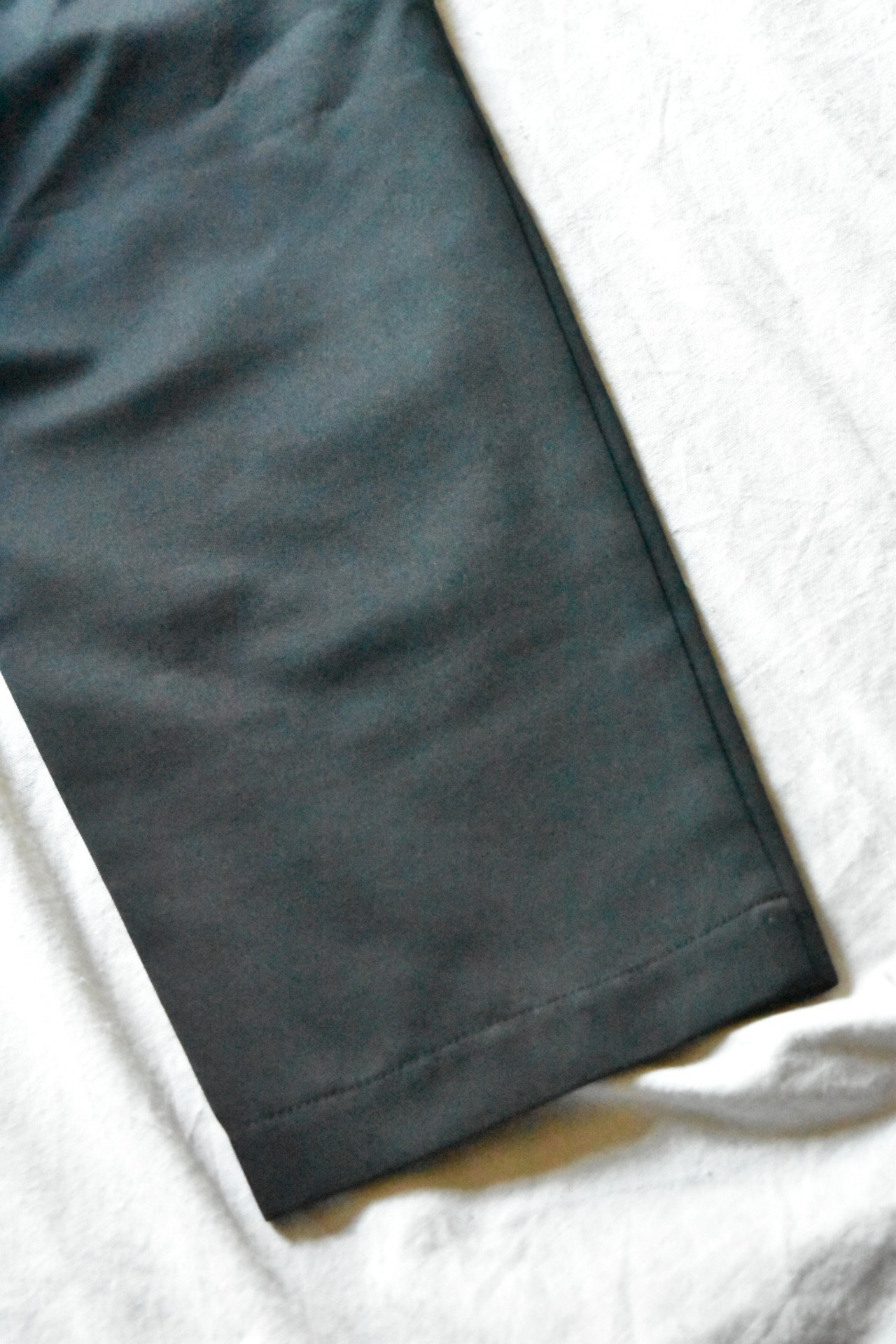 "BLACK COMME DES GARCONS” 3/4 length black trouser