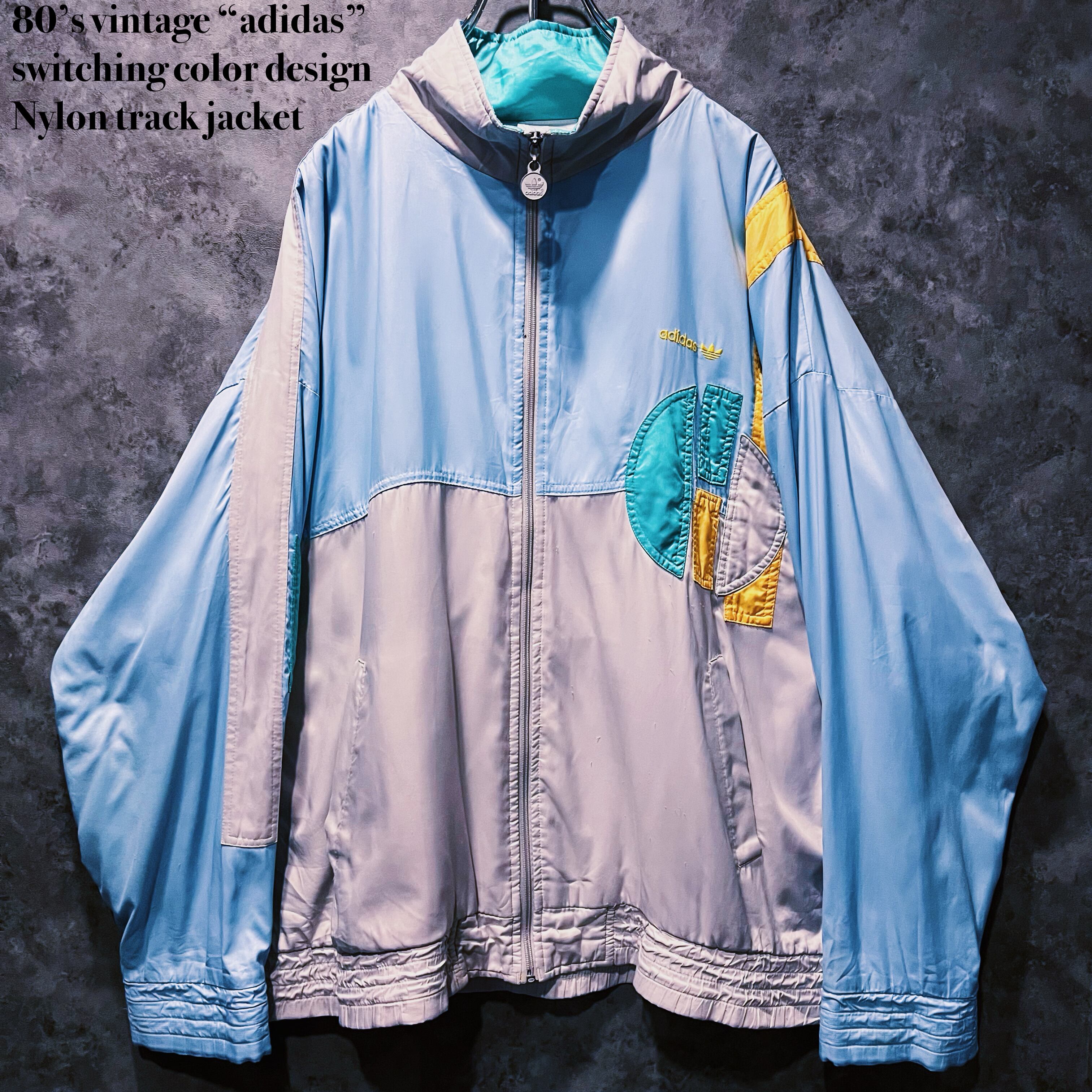 【doppio】80’s vintage “adidas” switching color design Nylon track jacket