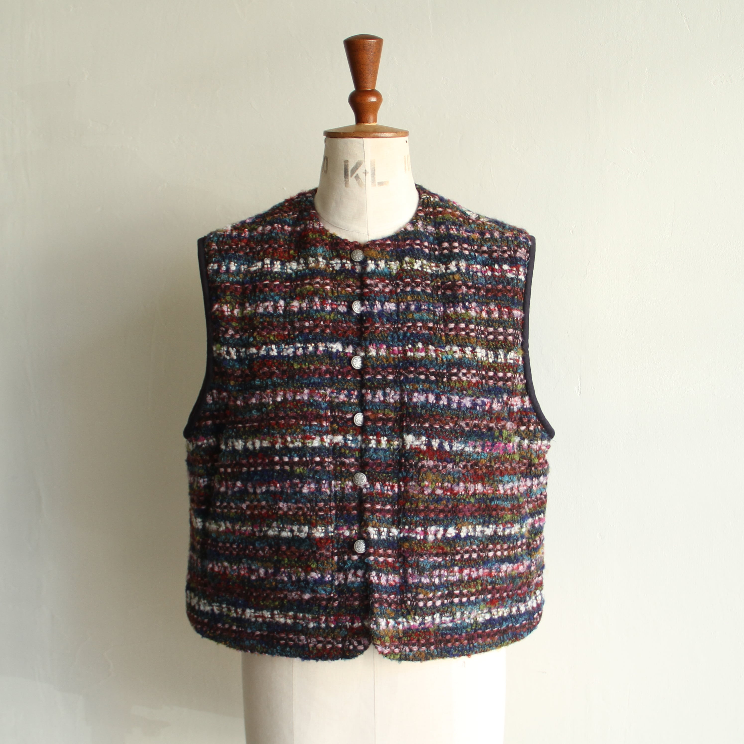 TOURNON. Tweed vest