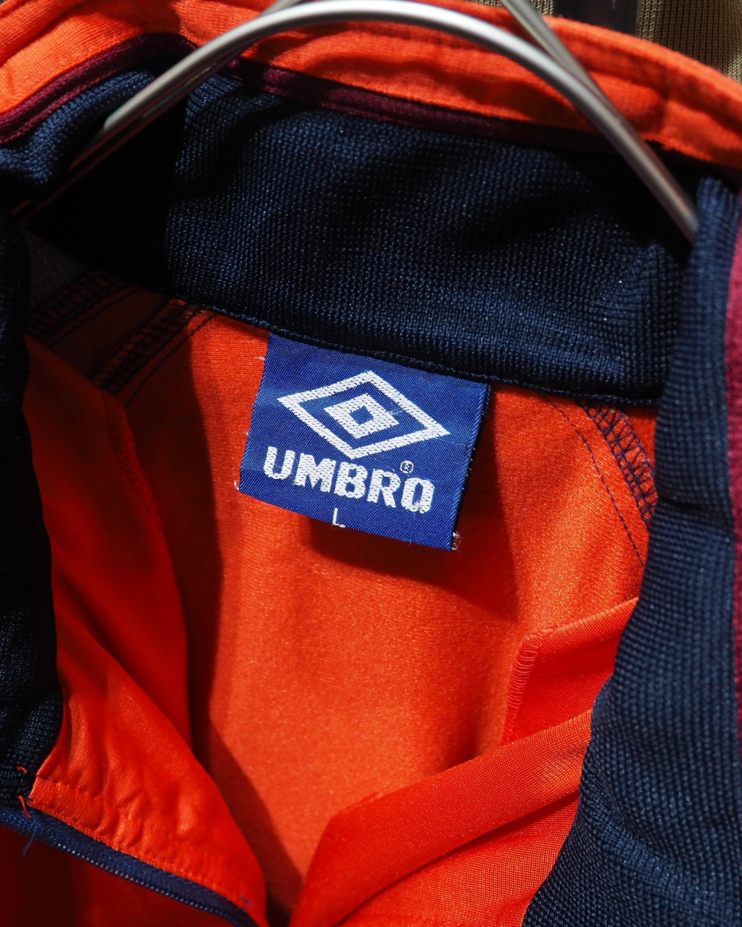1990s " UMBRO " Vivid Orange × Dark Navy Switching Panel Vintage Loose Track Jacket