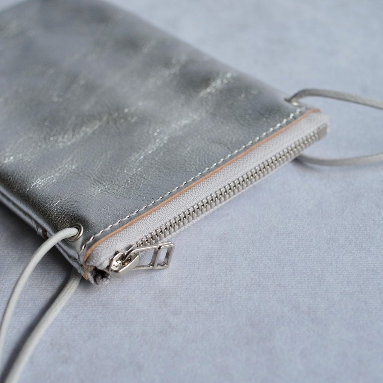 KN POCHETTE 12-01 SILVER