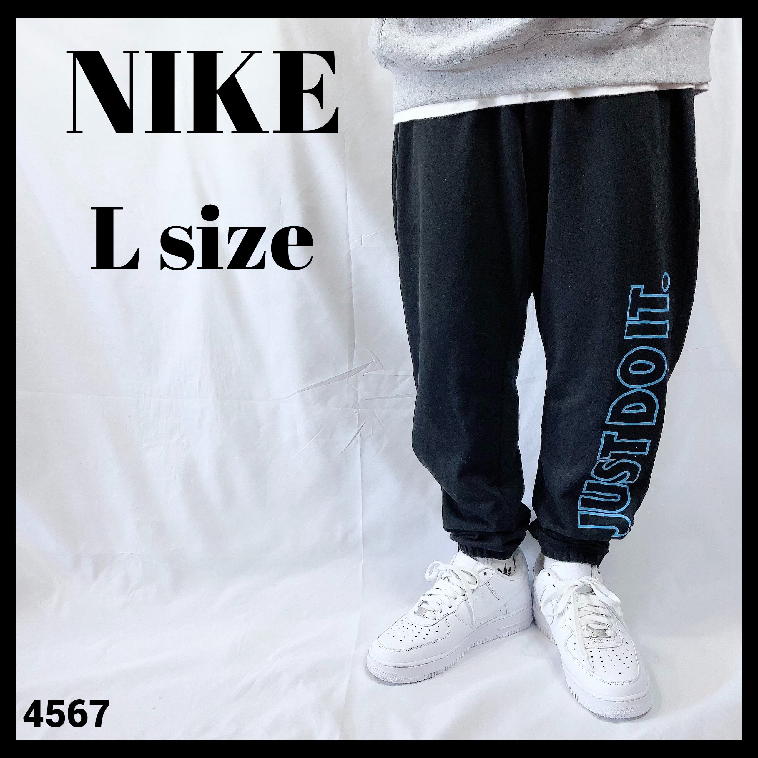 公式 NIKE ナイキ ジャージ下 ズボン パンツ 黒 レディース L