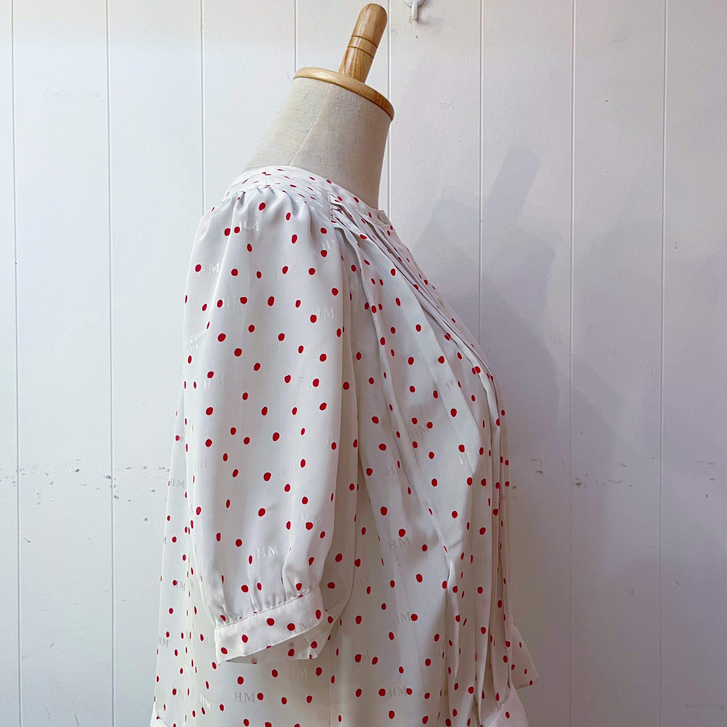 red dot pleats white blouse