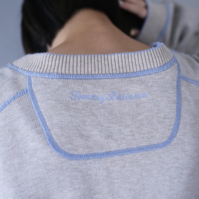 "2-way" stitch work design over silhouette sweat