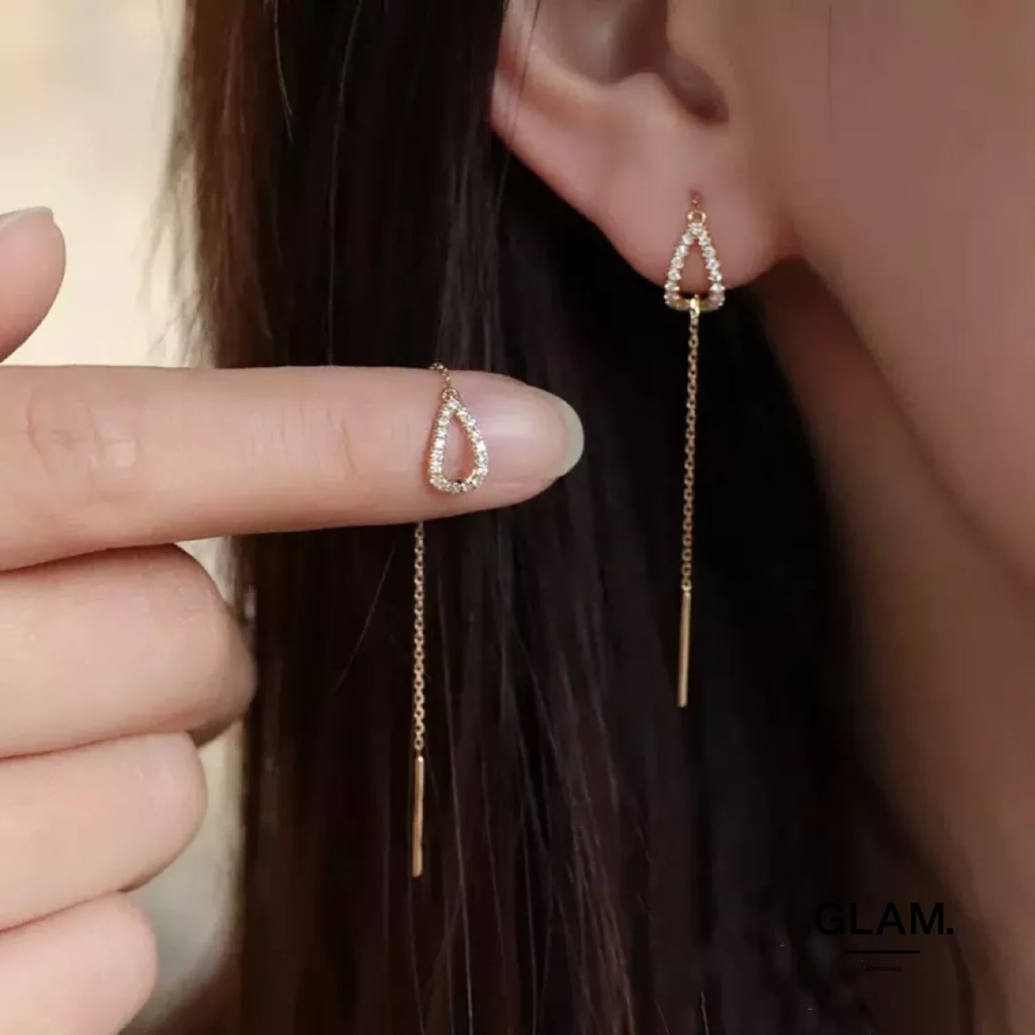 e.m. スタッズ チェーン ジルコニア ピアス ジルコニアタッセルチェーンピアス | 金属アレルギーに悩む女性