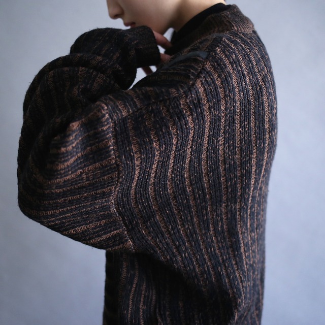 leather taping line and loose silhouette mock neck sweater