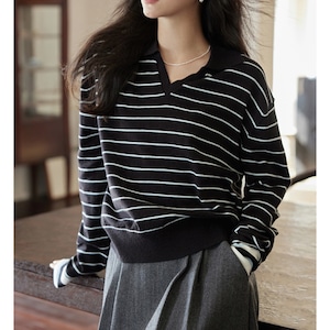 long sleeved black striped sweater