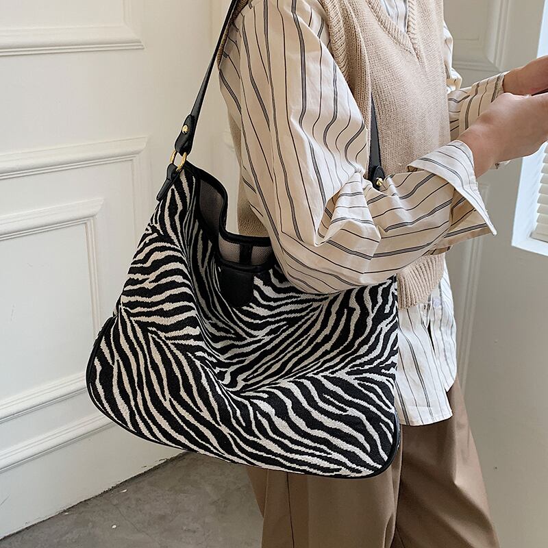 パターンカジュアルオータムウィンターレオパード 秋物 冬物 トートバッグ メッセンジャーバッグ Tiancai_Wing_Bag55470611136