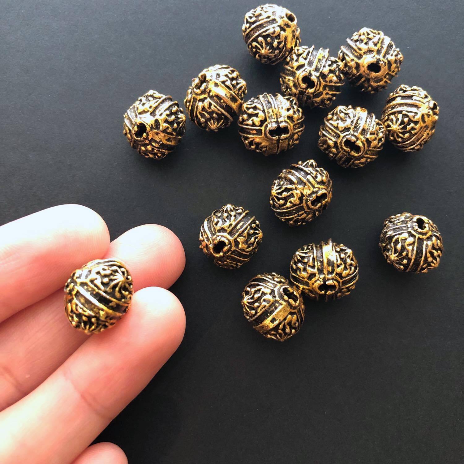再入荷〉太陽模様入り提灯型インドメタルビーズ | Dua-アクセサリー