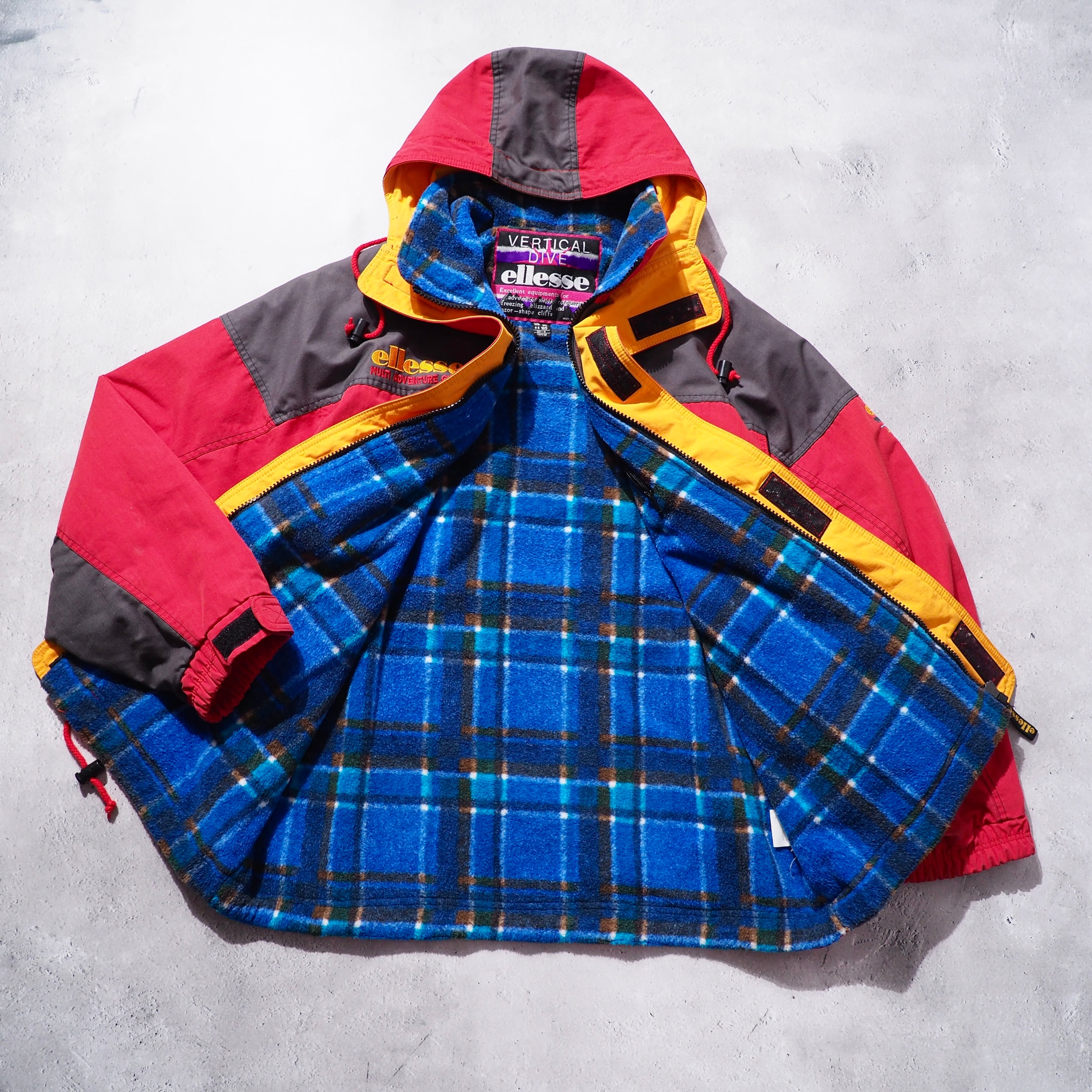 1980 - 90s ” ellesse ” Good multi color full zip vintage nylon jacket Parker