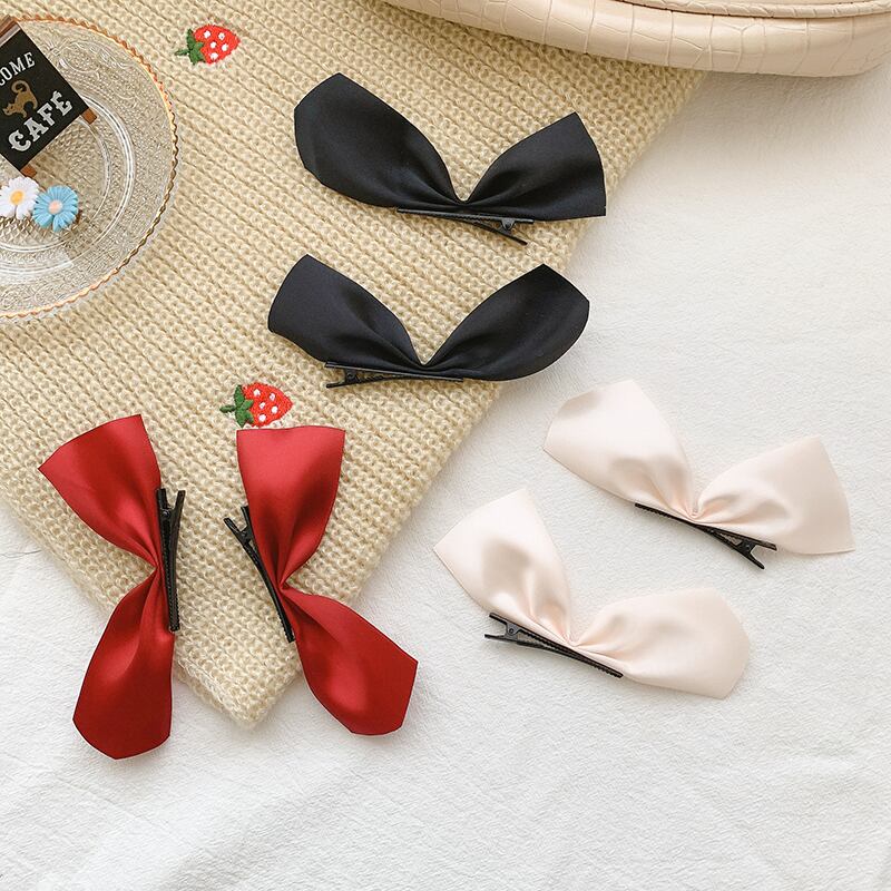 リボンヘアピン サイドレッドトップス バックアクセサリー ブラック・アイド・ピーズ86013308874