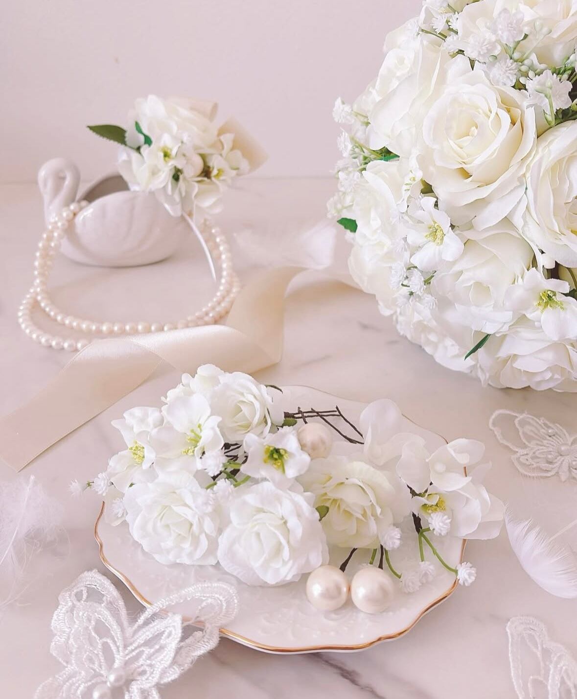 ♡Prima donnna♡ ホワイトローズとカスミソウのクラッチブーケ