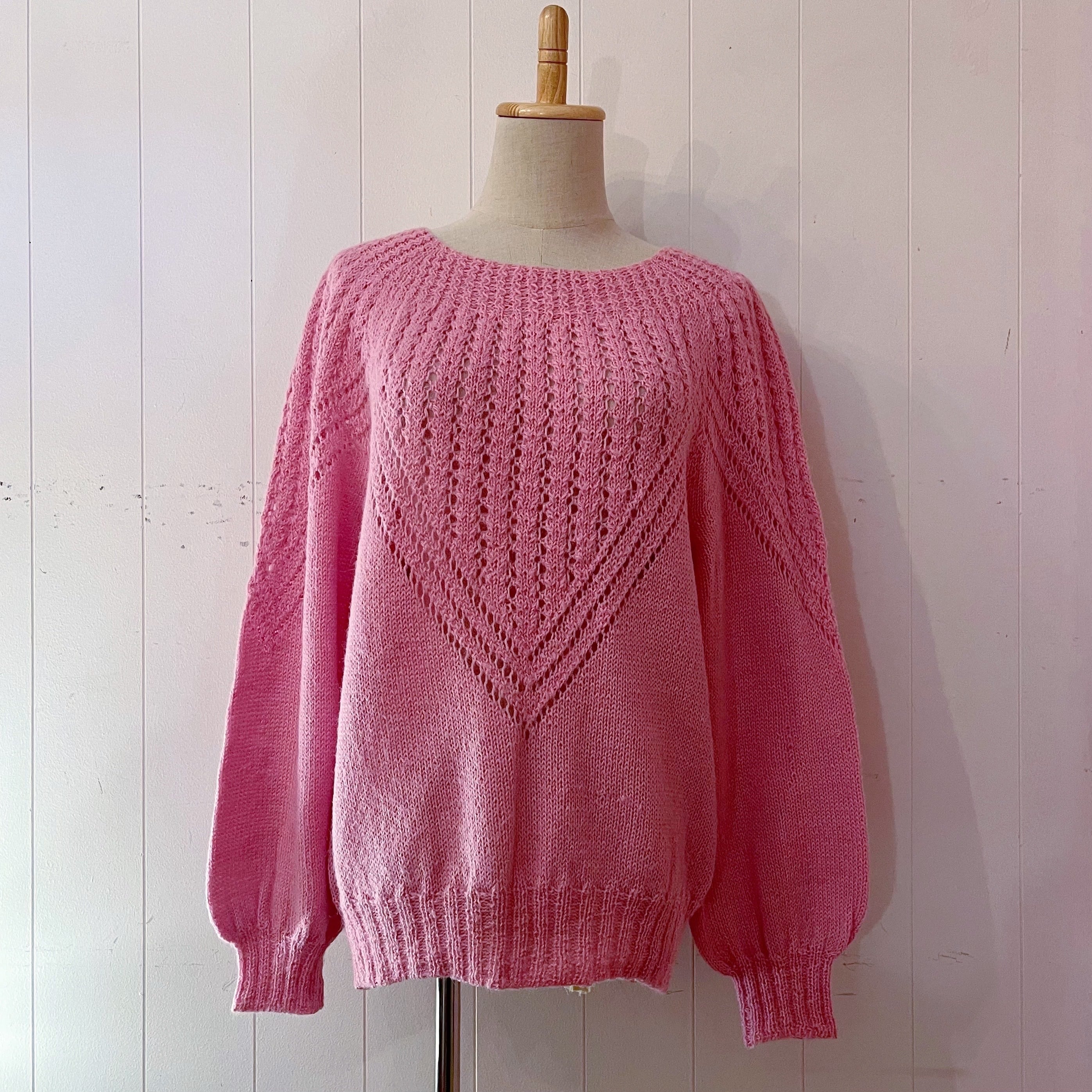 pink openwork knit sweater