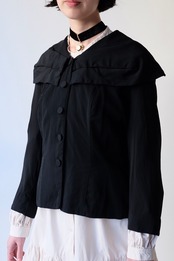 Black platter collar blouse