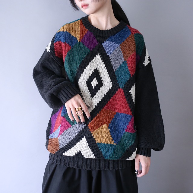 multi color art pattern over silhouette knit