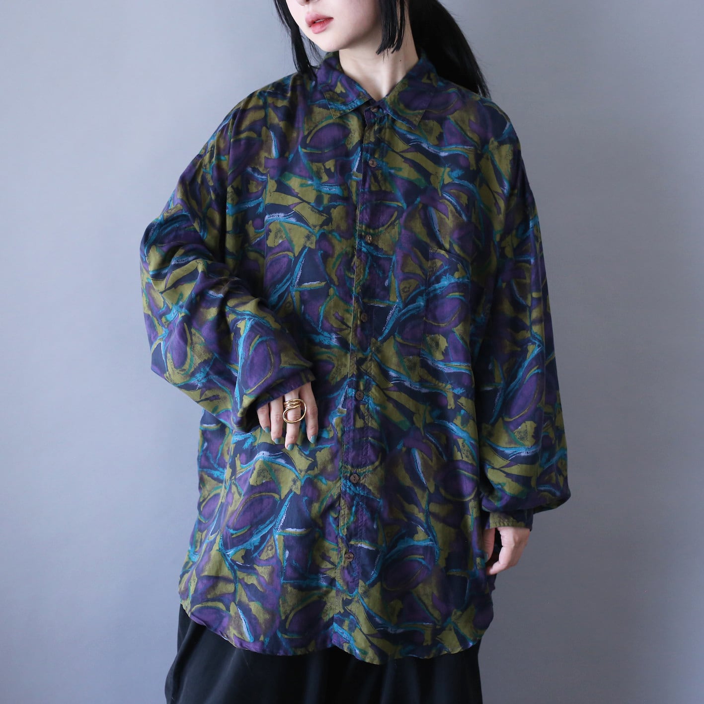 poison color abstract painting pattern over silhouette silk shirt