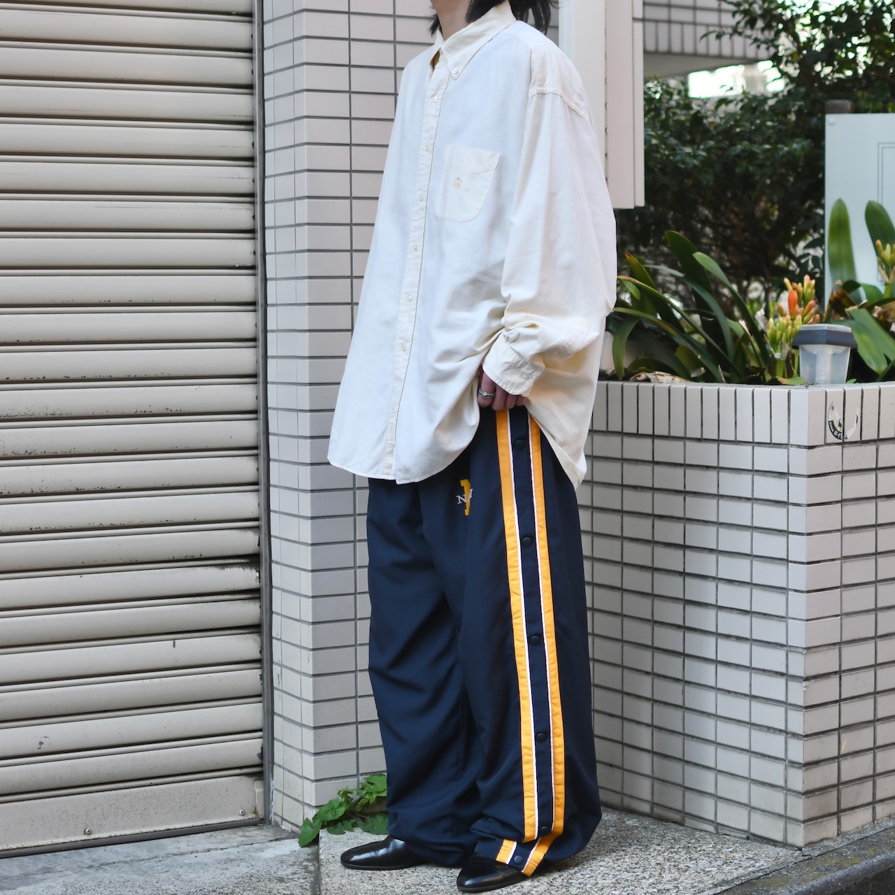 Champion side snap wide nylon pants