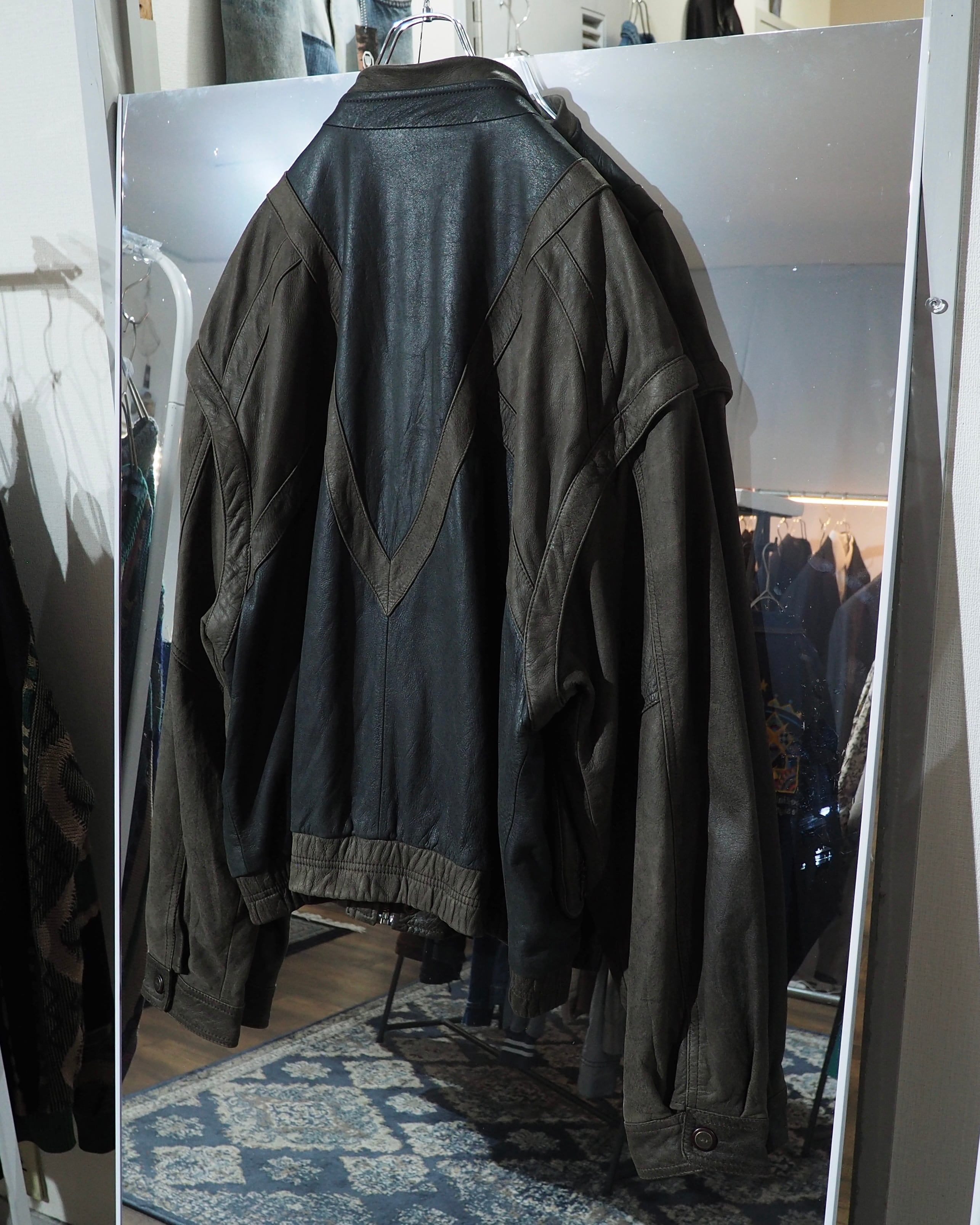 " 変形 × 分離 " Sleeve Detachable Gimmick × Panel Switching Vintage Loose Leather Jacket