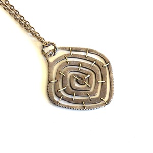 Vintage swirl cookie motif silver art necklace