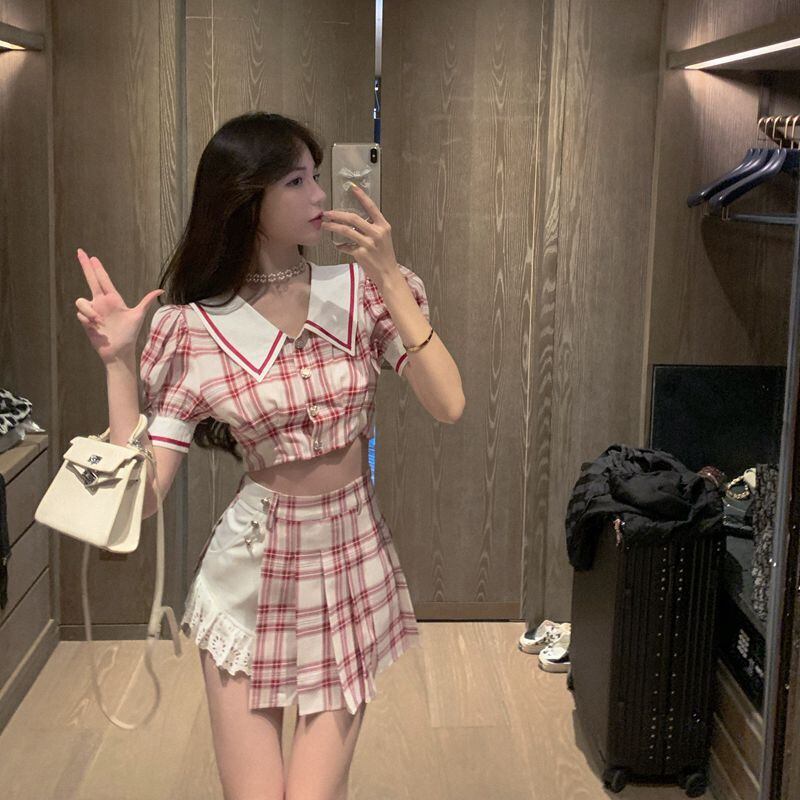 スタイル年齢を減らす小さな男のスーツ2020新しい女性の夏のプリーツスカートチェック柄トップツーピーススーツ ブラックストロベリース54212158269