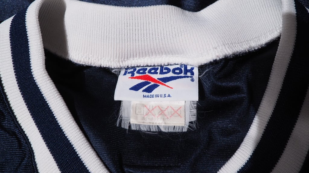 1990s Reebok Super gloss logo Embbossed game shirt | 古着屋 結々
