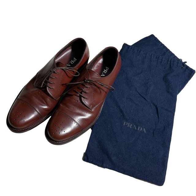 PRADA leather medallion shoes