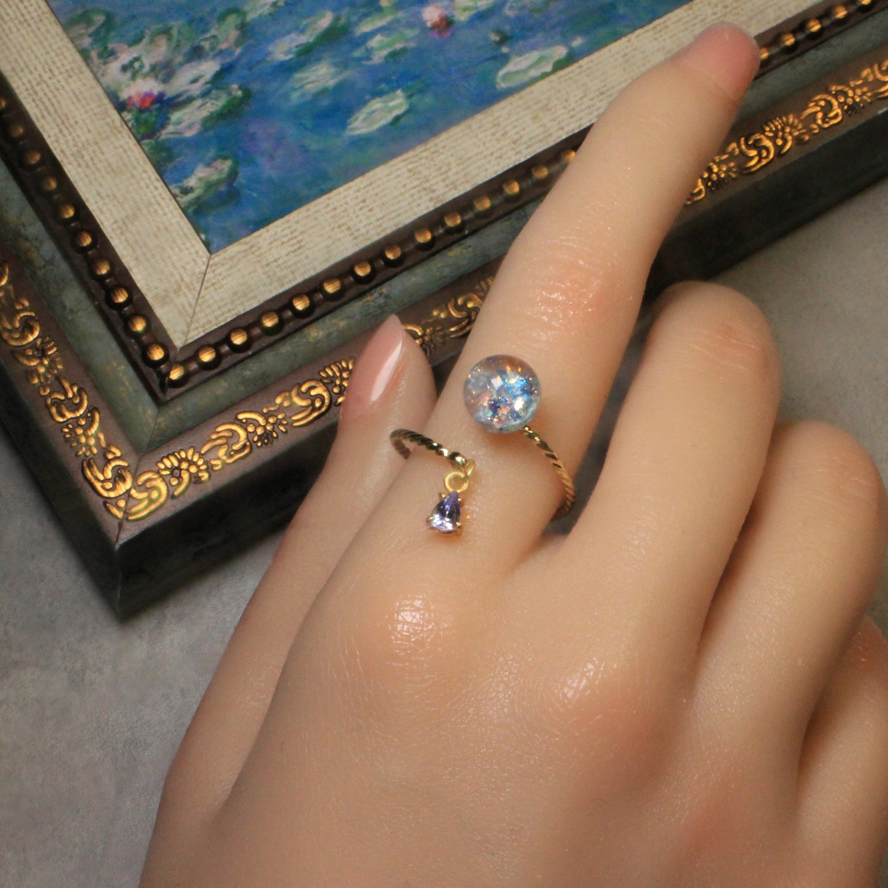 タンザナイト揺れる Lumière ring - mètèore モネ『睡蓮』を纏うリング 【受注制作】サージカルステンレス