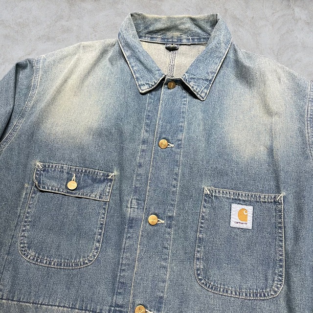 90’s Carhartt Michigan Denim Chore Coat curb