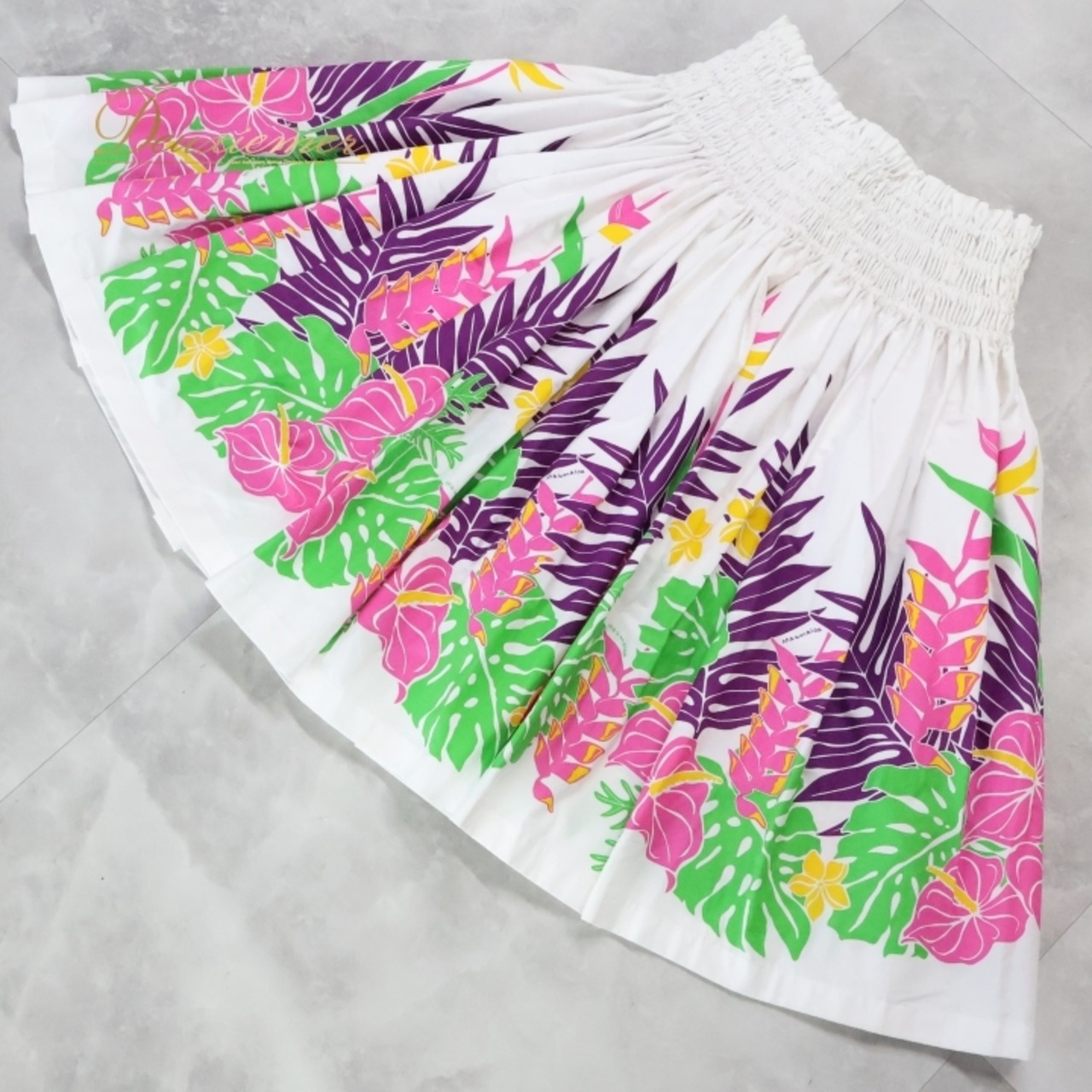 フラダンス 衣装 パウスカート エムエムジェイ ホワイト系 MMJ 日本製 プルメリア柄 モンステラ柄 カラフル シングル シンプル かわいい 華やか 鮮やか 明るい 白 緑 紫 黄 ピンク ハワイアン アロハ ハワイアンプリント フラ ダンス レッスン 練習