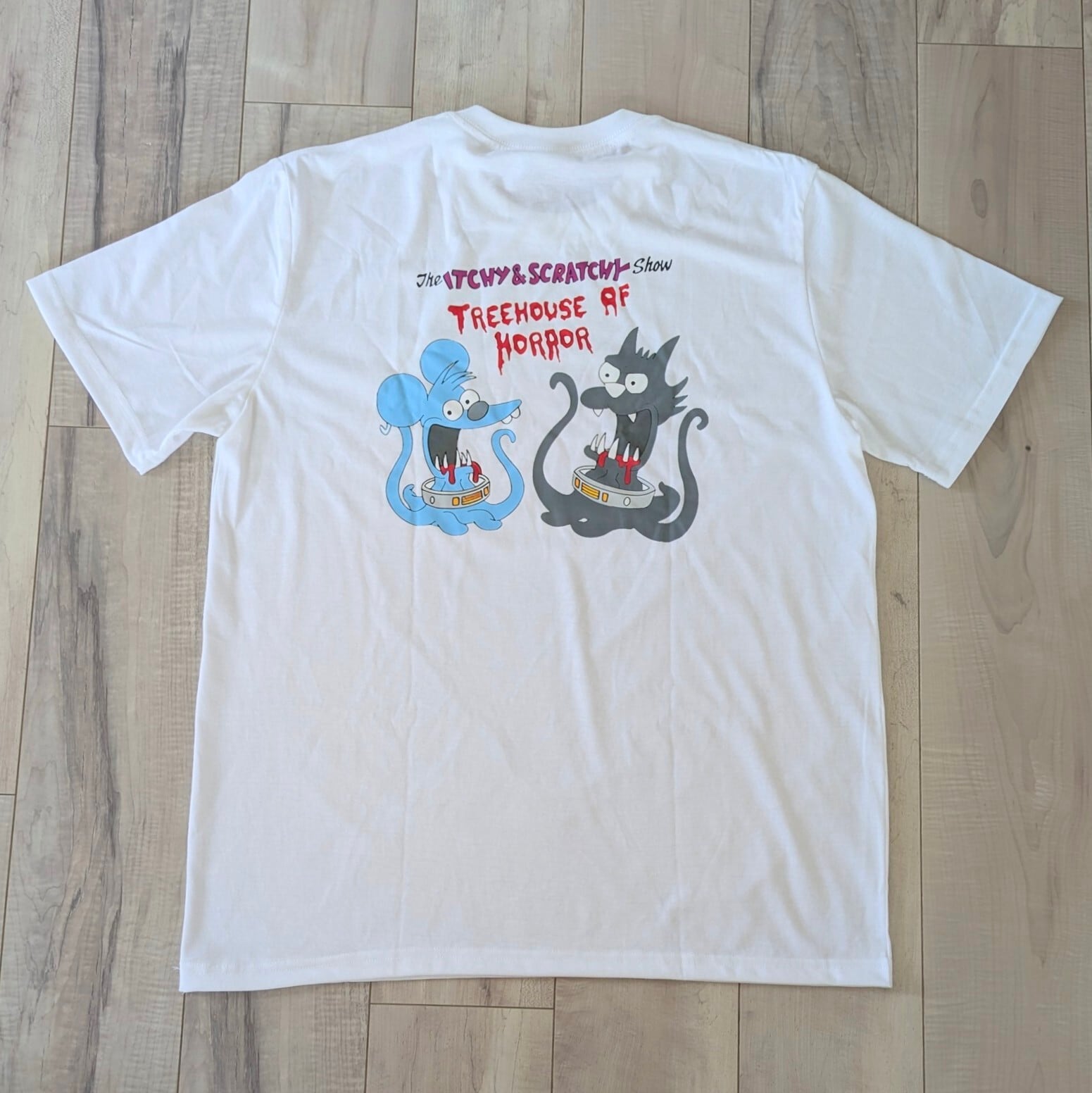 【 The Simpsons( ザ・シンプソンズ ) 】『 The Itchy & Scratchy Show / イッチー&スクラッチー 』 「Treehouse of Horror」(ツリーハウス・オブ・ホラー)/ Tシャツ / WHITE〚アメリカン雑貨 アメトイ〛