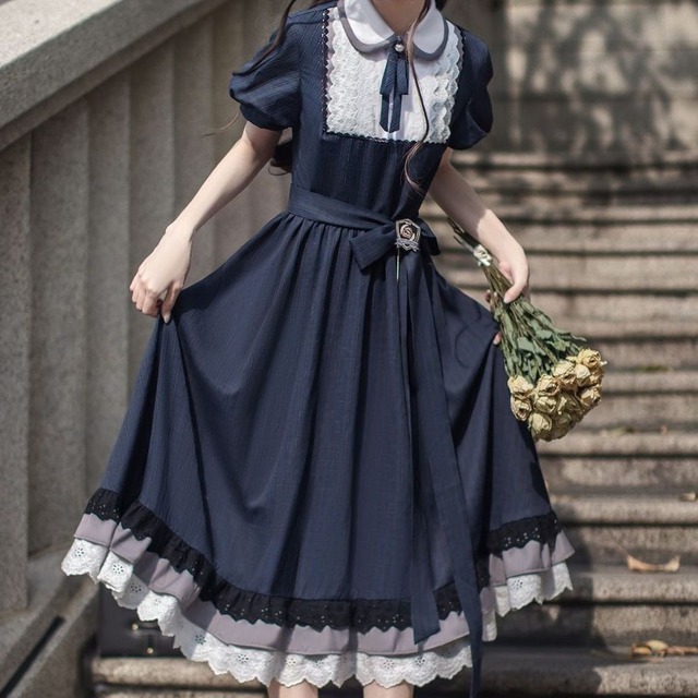 エレガントネイビーリボンバッチワンピース