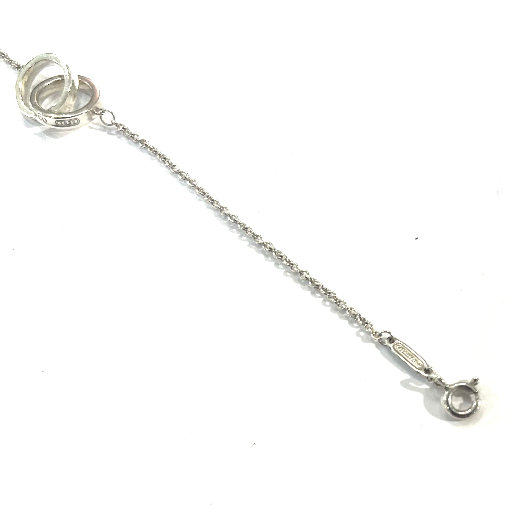 TIFFANY & Co.】 2754 ティファニー インターロッキング ダブルリング