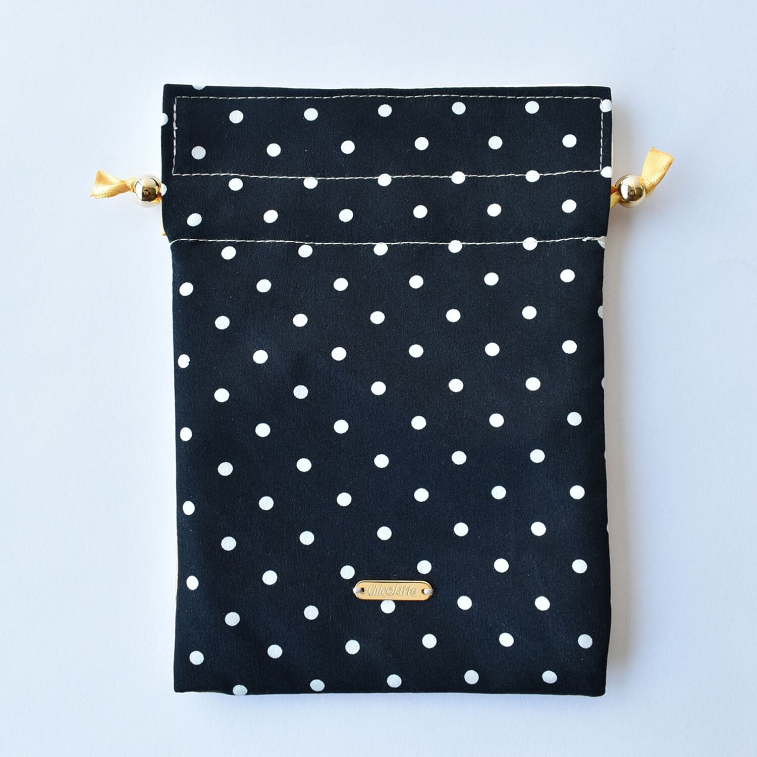 アダクワッタさんがヴィンテージ生地でひとつひとつハンドメイドで手掛ける巾着 アダクワッタさんがヴィンテージ生地でひとつひとつハンドメイドで