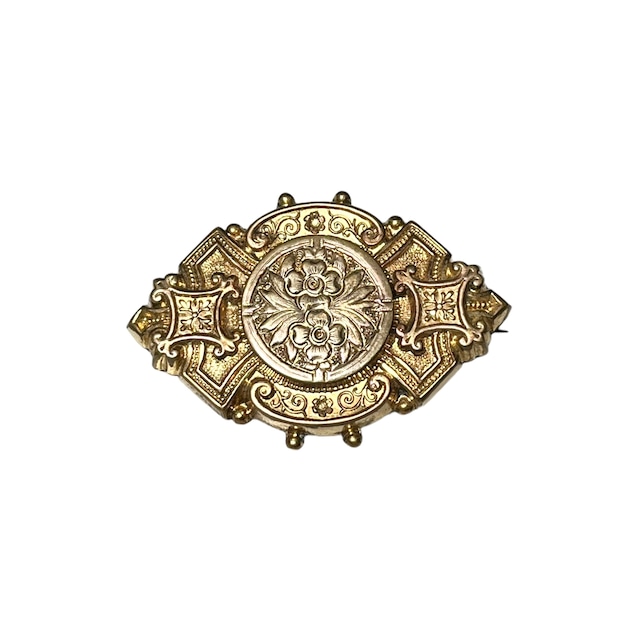 antique metal engraved brooch
