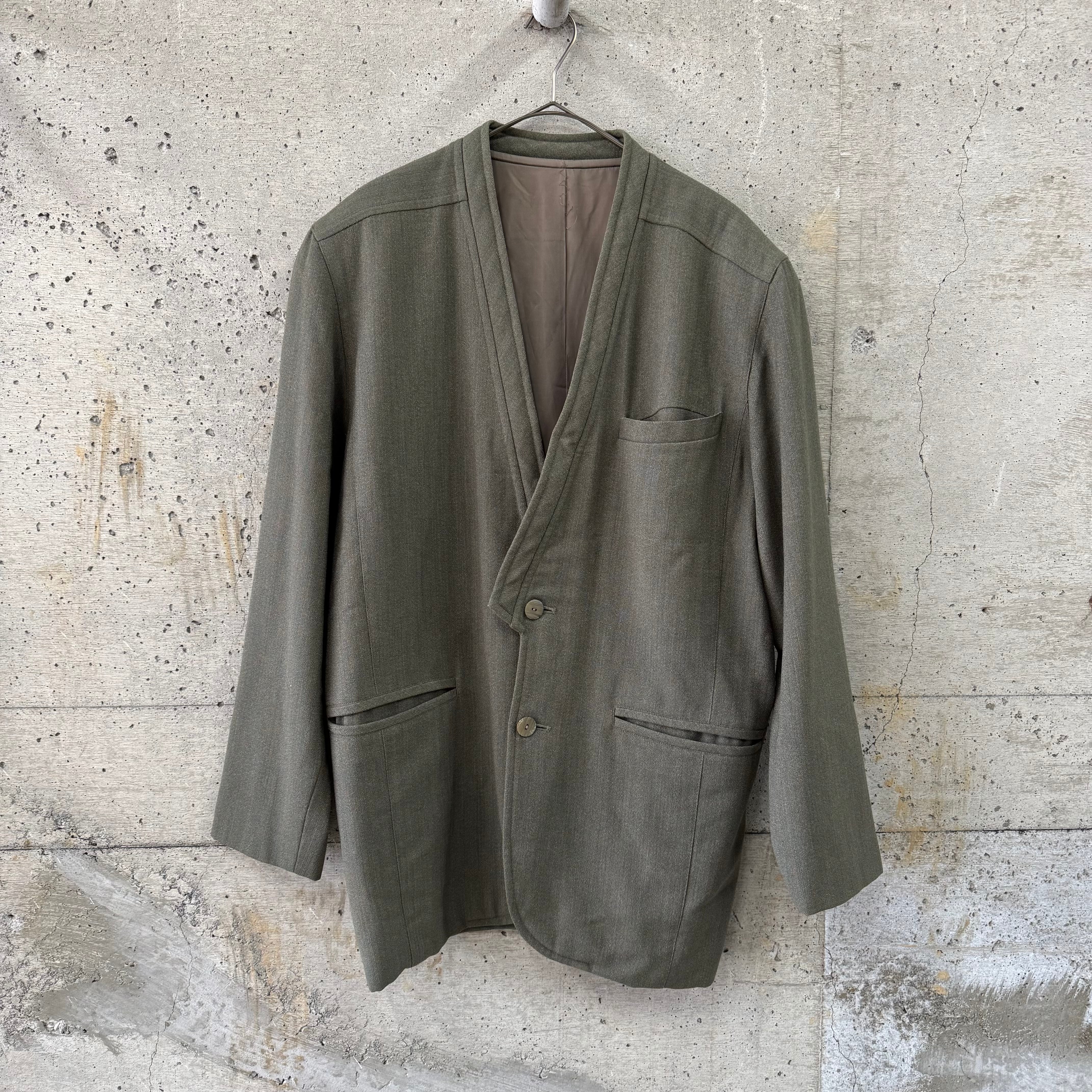 Moss green collarless tailored jacket