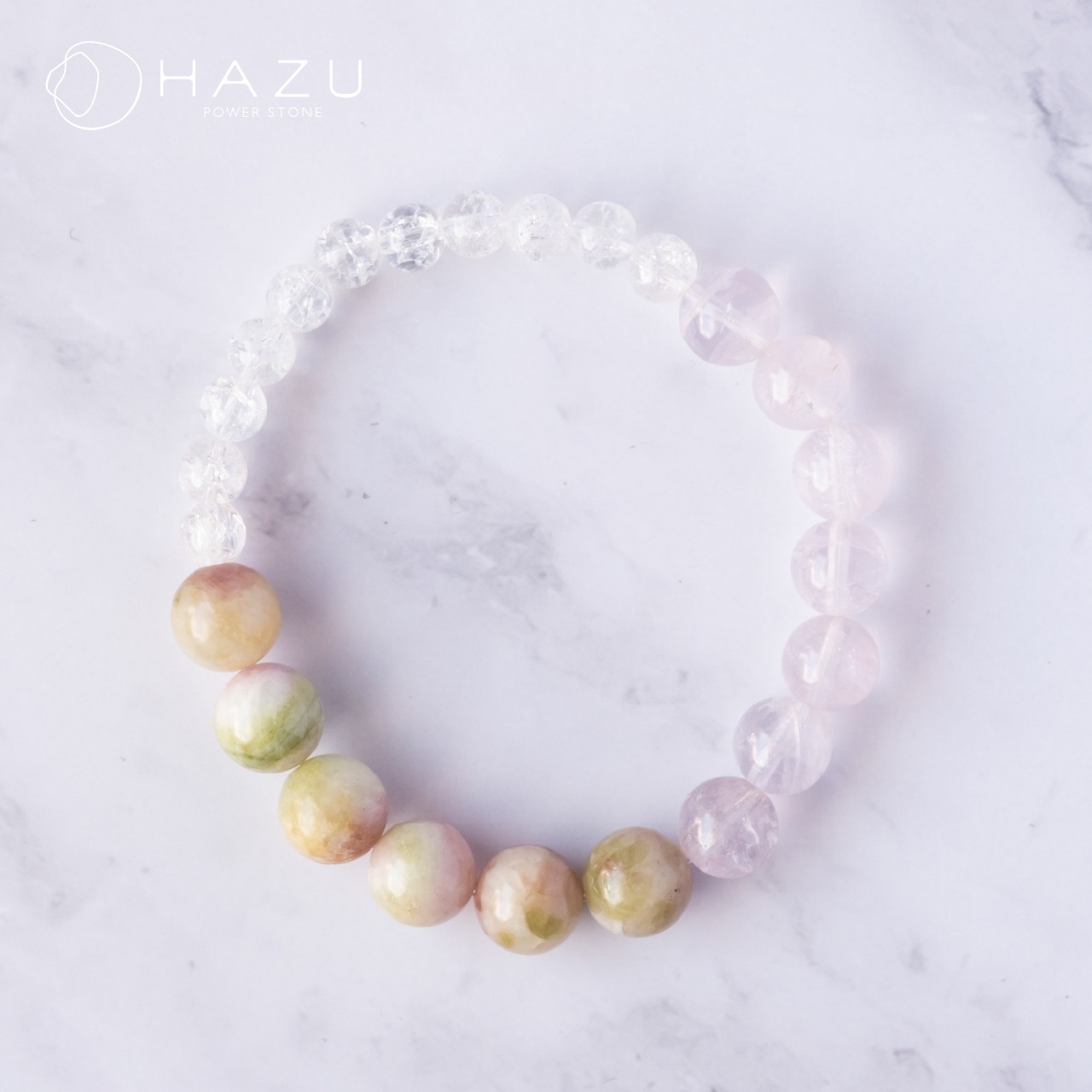 重なり合う花咲くブレス［ウォーターメロントルマリン／ローズクォーツ／クラック水晶］