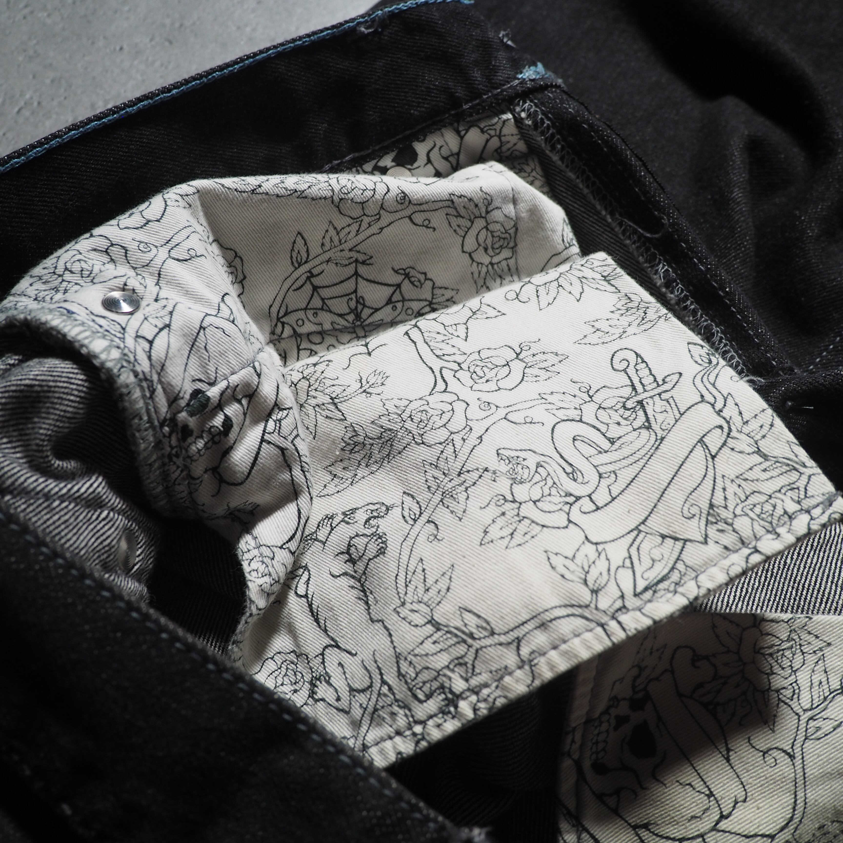 ” Montage ” Back logo painted Black loose Buggy Denim pants